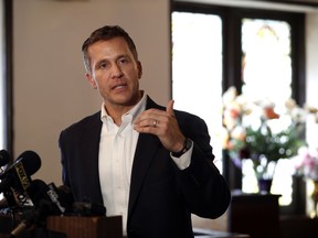 FILE- In this Sept. 11, 2017, file photo, Missouri Gov. Eric Greitens speaks to the media after meeting with clergy at Washington Metropolitan AME Zion Church ahead of a verdict in the trial of former St. Louis police officer Jason Stockley in St. Louis. Greitens' campaign promises are being put to the test by protests that began after Stockley was acquitted in the death of a black drug suspect. As a candidate, Greitens asserted that there could have been peace "by the second night" in Ferguson if the governor had exerted a commanding presence. (AP Photo/Jeff Roberson, File)