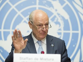 FILE- In this July 14, 2017, photo, United Nations Special Envoy for Syria Staffan de Mistura speaks at a news conference at Palais des Nations in Geneva, Switzerland. The United Nations' top envoy for Syria says the next round of talks between the government and opposition will take place as soon as "in about a month" and no later than early November. De Mistura said Wednesday, Sept. 27, that both sides should show readiness to negotiate on four key issues: local and central governance, a new constitution, U.N. supervised elections and combating terrorism. (Xu Jinquan/Pool Photo via AP, File)