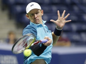 Kevin Anderson, of South Africa, hits a forehand to Sam Querrey, of the United States, during a quarterfinal at the U.S. Open tennis tournament in New York, early Wednesday, Sept. 6, 2017. (AP Photo/Kathy Willens)