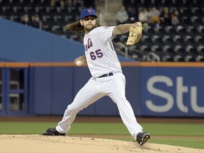 New York Mets pitcher Robert Gsellman winds up during the first inning of a baseball game against the Philadelphia Phillies, Wednesday, Sept. 6, 2017, in New York. (AP Photo/Bill Kostroun)