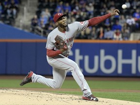 Cincinnati Reds pitcher Amir Garrett delivers the ball to the New York Mets during the first inning of a baseball game Friday, Sept. 8, 2017, in New York. (AP Photo/Bill Kostroun)