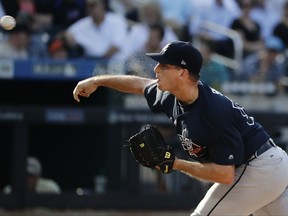 Atlanta Braves' Lucas Sims delivers a pitch during the second inning of a baseball game against the New York Mets Monday, Sept. 25, 2017, in New York. (AP Photo/Frank Franklin II)