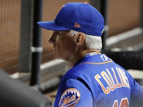 New York Mets manager Terry Collins (10) watches his team take the field before the first inning of the second baseball game of a doubleheader against the Atlanta Braves, Monday, Sept. 25, 2017, in New York. (AP Photo/Frank Franklin II)