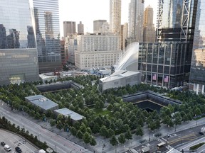 The National September 11 Memorial and Museum are set for a memorial service, Monday, Sept. 11, 2017, in New York. Thousands of 9/11 victims' relatives, survivors, rescuers and others are expected to gather Monday at the World Trade Center to remember the deadliest terror attack on American soil. Nearly 3,000 people died when hijacked planes slammed into the trade center, the Pentagon and a field near Shanksville, Pa., on Sept. 11, 2001. (AP Photo/Mark Lennihan)