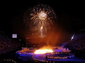 FILE - This Feb. 8, 2002 file photo shows fireworks erupting during the opening ceremonies of the 2002 Winter Olympics in Salt Lake City. There's an outside shot the United States won't have to wait 11 years to host its next Olympics. It's a longshot, but there's talk in Salt Lake City, and even some in Denver, of a bid for the 2026 Winter Games, which take place two years before the Summer Olympics return to Los Angeles. (AP Photo/Kevork Djansezian, file)