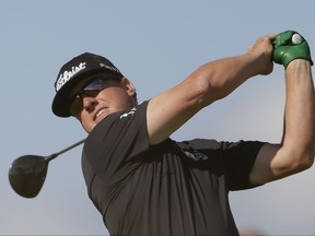 File-This July 20, 2017, file photo shows Charley Hoffman of the United States playing off the 15th tee during the first round of the British Open Golf Championship, at Royal Birkdale, Southport, England. Hoffman was a captain's pick to be play in the Presidents Cup later this month at Liberty National. (AP Photo/Alastair Grant, File)