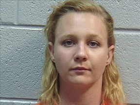 FILE - This June 2017 file photo released by the Lincoln County (Ga.) Sheriff's Office, shows Reality Winner. Attorneys for Winner, accused of leaking a classified U.S. report, are asking a federal judge to reconsider his decision months ago to keep her jailed pending trial. Former Air Force linguist Winner has been locked up since she June, when she was charged with copying a classified report and mailing it to an online news organization.  (Lincoln County (Ga.) Sheriff's Office via AP, File)