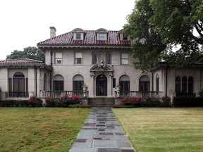 FILE - A Thursday, July 8, 2010 file photo shows a Detroit mansion once owned by Motown Records founder Berry Gordy Jr. The public will be able to celebrate Detroit's musical history by taking part in an estate sale and live global auction of the contents of the "Motown Mansion" in early October, 2017.  (AP Photo/Paul Sancya, File)