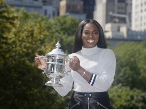 2017 US Open women's champion Sloane Stephens poses for a picture in Central Park in New York, Sunday, Sept. 10, 2017. (AP Photo/Seth Wenig)