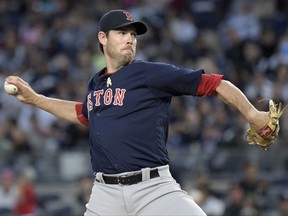Boston Red Sox starting pitcher Doug Fister delivers the ball to the New York Yankees during the first inning of a baseball game Friday, Sept. 1, 2017, at Yankee Stadium in New York. (AP Photo/Bill Kostroun)