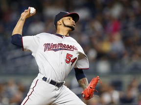 Minnesota Twins starting pitcher Ervin Santana delivers during the first inning of a baseball game against the New York Yankees in New York, Monday, Sept. 18, 2017. (AP Photo/Kathy Willens)