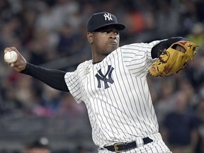 New York Yankees starting pitcher Luis Severino delivers to the Boston Red Sox during the first inning of a baseball game Sunday, Sept.3, 2017, at Yankee Stadium in New York. (AP Photo/Bill Kostroun)