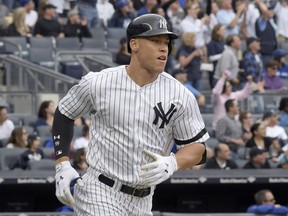 New York Yankees' Aaron Judge rounds the bases with a home run during the fourth inning of a baseball game against the Toronto Blue Jays, Saturday, Sept.30, 2017, at Yankee Stadium in New York. (AP Photo/Bill Kostroun)