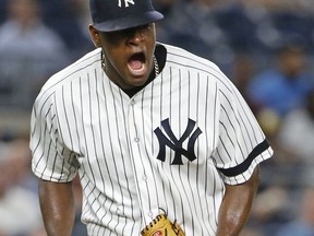 New York Yankees starting pitcher Luis Severino reacts after Tampa Bay Rays Corey Dickerson struck out with two runners on base for the third out during the third inning of a baseball game in New York, Wednesday, Sept. 27, 2017. (AP Photo/Kathy Willens)