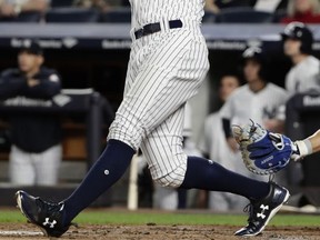 New York Yankees' Aaron Judge follows through on a home run during the first inning of a baseball game against the Tampa Bay Rays on Thursday, Sept. 28, 2017, in New York. (AP Photo/Frank Franklin II)