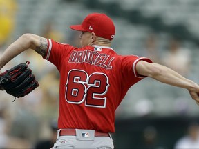 Los Angeles Angels pitcher Parker Bridwell works against the Oakland Athletics in the first inning of a baseball game, Monday, Sept. 4, 2017, in Oakland, Calif. (AP Photo/Ben Margot)