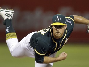 Oakland Athletics pitcher Daniel Mengden works against the Seattle Mariners in the first inning of a baseball game Tuesday, Sept. 26, 2017, in Oakland, Calif. (AP Photo/Ben Margot)