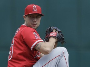 Los Angeles Angels starting pitcher Tyler Skaggs throws to the Oakland Athletics during the first inning of a baseball game Wednesday, Sept. 6, 2017, in Oakland, Calif. (AP Photo/Marcio Jose Sanchez)