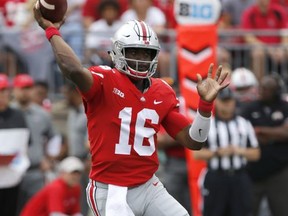 Ohio State quarterback J.T. Barrett throws a pass against Army during the first half of an NCAA college football game Saturday, Sept. 16, 2017, in Columbus, Ohio. (AP Photo/Jay LaPrete)