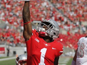 Ohio State receiver Johnnie Dixon celebrates his touchdown against UNLV during the first half of an NCAA college football game Saturday, Sept. 23, 2017, in Columbus, Ohio. (AP Photo/Jay LaPrete)