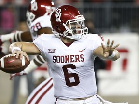 Oklahoma quarterback Baker Mayfield drops back to pass against Ohio State during the first half of an NCAA college football game Saturday, Sept. 9, 2017, in Columbus, Ohio. (AP Photo/Jay LaPrete)