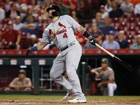 St. Louis Cardinals' Yadier Molina hits a three-run home run off Cincinnati Reds starting pitcher Jackson Stephens in the fourth inning of a baseball game, Tuesday, Sept. 19, 2017, in Cincinnati. (AP Photo/John Minchillo)