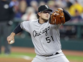Chicago White Sox starting pitcher Carson Fulmer delivers in the first inning of a baseball game against the Cleveland Indians, Saturday, Sept. 30, 2017, in Cleveland. (AP Photo/Tony Dejak)