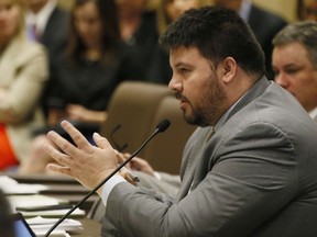 FILE - In this Feb. 22, 2017, file photo, state Sen. Ralph Shortey, R-Oklahoma City, speaks during a Senate committee meeting on a Real ID bill in Oklahoma City. Shortey, who faces state child prostitution charges for allegedly hiring a 17-year-old boy for sex, has been indicted by a federal grand jury on child pornography and child sex trafficking charges. The four-count federal indictment that was unsealed Wednesday, Sept. 6, 2017. Shortey resigned in March after he was arrested on state charges. He faces up to life in prison if convicted on the federal charges. (AP Photo/Sue Ogrocki, File)