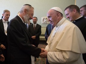 Pope Francis shakes hands with Riccardo Di Segni, Chief Rabbi of Rome, during an audience with the representatives of the Conference of European Rabbis, the Rabbinical Council of America and the Commission of the Chief Rabbinate of Israel at the Vatican, Thursday, Aug. 31, 2017. (L'Osservatore Romano/Pool Via AP)