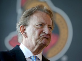 In this Sept. 7, 2017 file photo, Ottawa Senators owner Eugene Melnyk speaks to reporters at the Canadian Tire Centre.