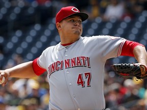 Cincinnati Reds starting pitcher Sal Romano delivers in the first inning of a baseball game against the Pittsburgh Piratesin Pittsburgh, Sunday, Sept. 3, 2017. (AP Photo/Gene J. Puskar)