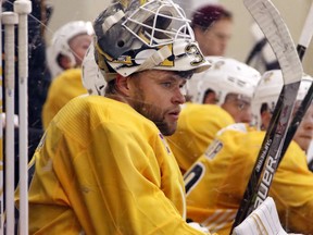 Pittsburgh Penguins goalie Antti Niemi watches a scrimmage during the NHL hockey team's first practice in Cranberry, Pa., Friday, Sept. 15, 2017. (AP Photo/Gene J. Puskar)