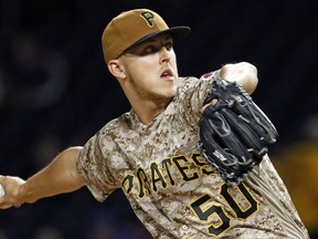 Pittsburgh Pirates starting pitcher Jameson Taillon delivers in the first inning of a baseball game against the Chicago Cubs, Thursday, Sept. 7, 2017, in Pittsburgh. (AP Photo/Gene J. Puskar)