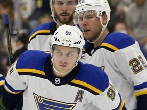 St. Louis Blues' Vladimir Tarasenko, bottom, skates to the bench after celebrating scoring a goal during the second period of an NHL preseason hockey game against the Pittsburgh Penguins, Sunday, Sept. 24, 2017, in Cranberry, Pa. (AP Photo/Keith Srakocic)