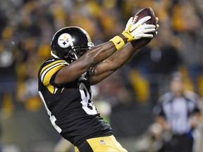FILE - In this Oct. 2, 2016, file photo, Pittsburgh Steelers wide receiver Antonio Brown (84) dances in celebration after scoring a touchdown in an NFL football game against the Kansas City Chiefs in Pittsburgh . Brown was penalized for the celebration. Freed by NFL officials to let loose in the end zone, Brown hopes to strut his stuff in Sunday's opener in Cleveland.  (AP Photo/Don Wright, File)