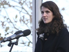 FILE - In this Nov. 22, 2013, file photo, Tatiana Schlossberg granddaughter of President John F. Kennedy makes a short speech during a ceremony at the JFK memorial at Runnymede, England. The New York Times reported that Schlossberg married George Moran on Sept. 9, 2017, in Massachusetts. (AP Photo/Alastair Grant, File)