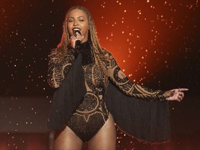 FILE - In this June 26, 2016, file photo, Beyonce performs "Freedom" at the BET Awards in Los Angeles. Beyonce released a surprise single Sept. 28, 2017, on which she sings in Spanish, English and French to raise relief money for those affected by hurricanes in the Caribbean and earthquakes in Mexico. (Photo by Matt Sayles/Invision/AP, File)