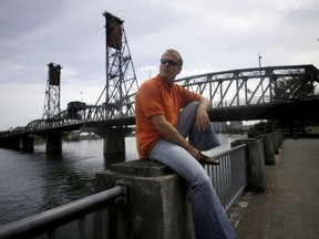 FILE - In this June 20, 2008, file photo, self-help author Tim Ferriss relaxes in downtown Portland, Ore. Houghton Mifflin Harcourt announced Sept. 6, 2017, that Ferriss' latest book, "Tribe of Mentors: Short Life Advice from the Best in the World," will be released Nov. 21. (AP Photo/Rick Bowmer, File)