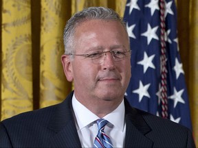 FILE – In this May 19, 2016, file photo, chemist Joseph DeSimone stands as President Barack Obama presents him with the National Medal of Technology and Innovation during a ceremony in the East Room of the White House in Washington. The Pittsburgh-based Heinz Family Foundation announced five individuals Thursday, Sept. 14, 2017, selected to receive this year's $250,000 prizes from the foundation, including DeSimone, an expert in polymeric materials honored for his research and his efforts to commercialize technology used in 3-D printing and other fields. The winners will be honored at an Oct. 18, banquet. (AP Photo/Carolyn Kaster, File)
