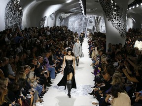 A model wears a creation for Christian Dior Spring/Summer 2018 ready-to-wear fashion collection presented in Paris, Tuesday, Sept.26, 2017. (AP Photo/Francois Mori)