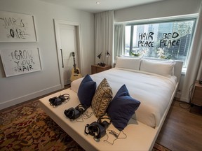 The bed is seen during the unveiling of a new design of the hotel suite made famous by John Lennon and Yoko Ono during their 1969 bed-in for peace, Thursday, September 21, 2017 in Montreal. THE CANADIAN PRESS/Paul Chiasson