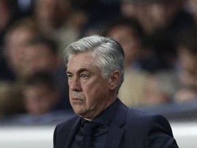 Bayern coach Carlo Ancelotti watches his team during a Champions League Group B soccer match between Paris Saint-Germain and Bayern Munich at the Parc des Princes stadium in Paris, France, Wednesday, Sept. 27, 2017. (AP Photo/Christophe Ena)
