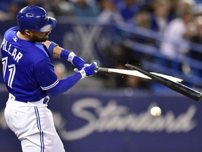 Kevin Pillar of the Toronto Blue Jays shatters his bat as he fouls off a pitch during MLB action Monday night at Rogers Centre. The Jays dealt a major blow to the wild card aspirations of the Baltimore Orioles with a 4-3 victory.