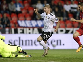 Germany's Timo Werner, center, scores the opening goal during the World Cup Group C qualifying soccer match between Czech Republic and Germany in Prague, Czech Republic, Friday, Sept. 1, 2017. (AP Photo/Petr David Josek)