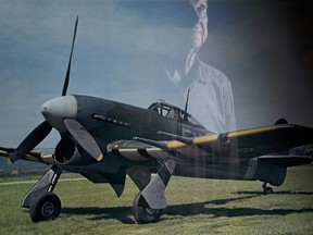 World War Two fighter pilot Frank Johnson is mirrored in a photograph of a Hawker Typhoon which he piloted in the war, at his home in Mississauga, Thursday November 7, 2013.