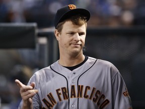 San Francisco Giants pitcher Matt Cain walks through the dugout during the third inning of a baseball game against the Arizona Diamondbacks Wednesday, Sept. 27, 2017, in Phoenix.  San Francisco pitcher Matt Cain says he'll retire after his start at home on Saturday against San Diego. The 32-year-old Cain informed teammates of his decision in a closed meeting before Wednesday's game at Chase Field against the Arizona Diamondbacks.  (AP Photo/Ross D. Franklin)