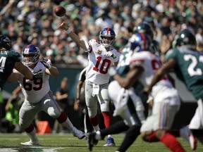 New York Giants' Eli Manning (10) passes during the first half of an NFL football game against the Philadelphia Eagles, Sunday, Sept. 24, 2017, in Philadelphia. (AP Photo/Matt Rourke)