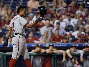 Washington Nationals' Wilmer Difo reacts after striking out against Philadelphia Phillies relief pitcher Adam Morgan during the seventh inning of a baseball game, Tuesday, Sept. 26, 2017, in Philadelphia. Philadelphia won 4-1. (AP Photo/Matt Slocum)