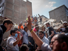 Rescue workers search a collapsed building following an earthquake in the neighborhood of Condesa, Mexico City, Mexico, on Tuesday, Sept. 19, 2017.