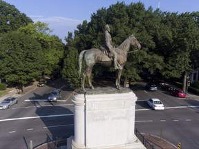 This Tuesday, Aug. 22, 2017, photo shows a view of the statue of Confederate Gen. Stonewall Jackson on Monument Avenue in Richmond, Va. Some of the oldest and largest Confederate statues in the U.S. tower over Monument Avenue, a four-lane road in Richmond. (Chad Williams/DroneBase via AP)